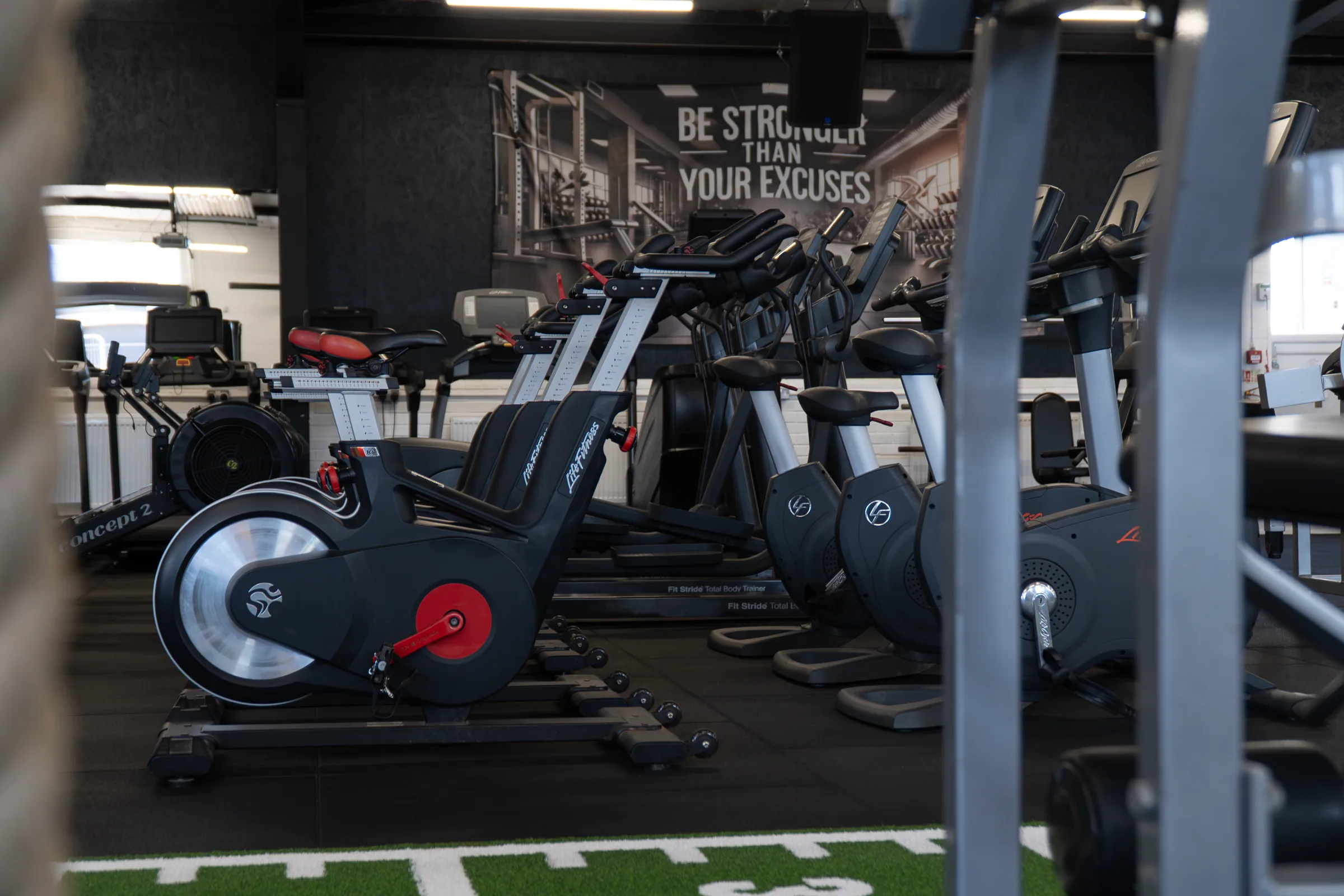 Exercise bikes, cross trainers and other cardio equipment across the VK Gym floor.